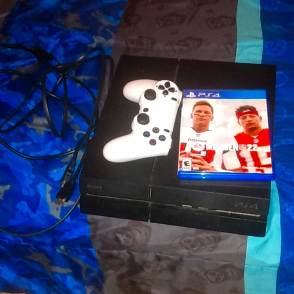 Used PlayStation 4 with the cables and one game. Its in perfect condition.